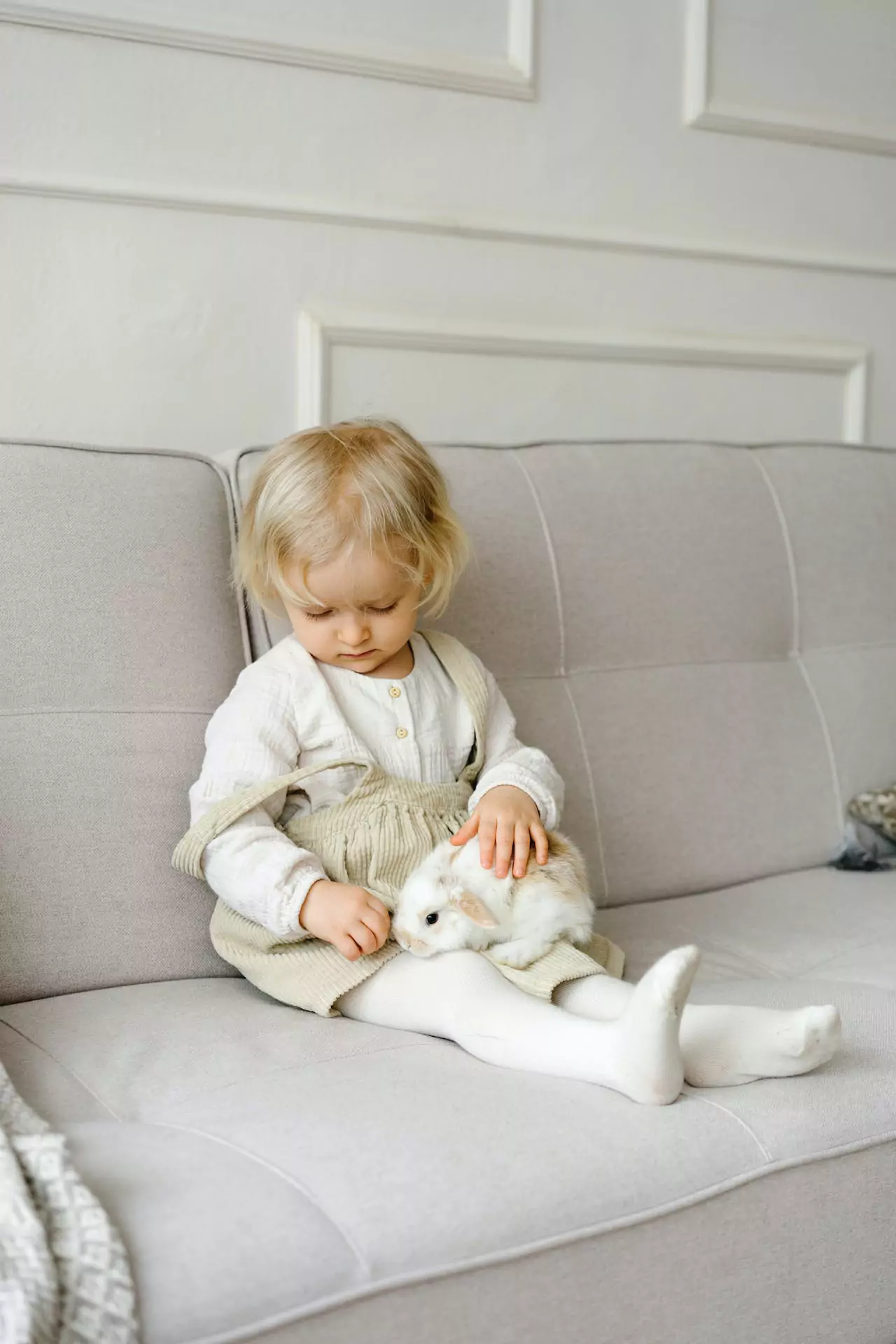 child holding a bunny